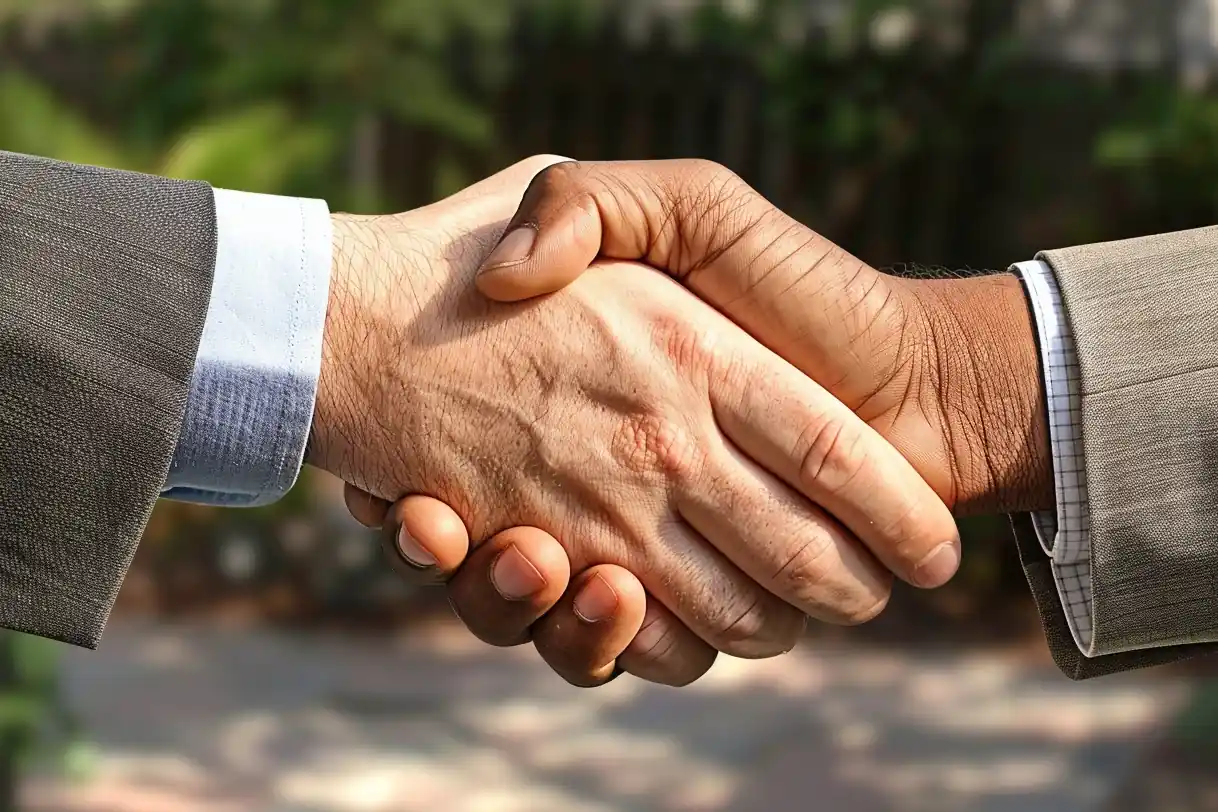 two men shaking hands